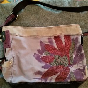 tote color is light with floral applique